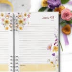 arquivo_digital_agenda_encanto_floral_lilas_amarelo_laranja_branco_1_dia_pagina_2026